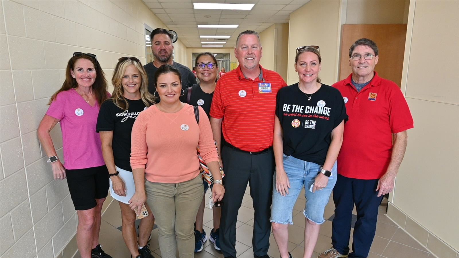 Representatives from H-E-B and PJ’s Coffee of New Orleans join other volunteers as Bus Buddies at Rennell Elementary School. 